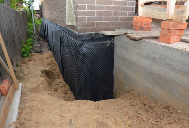 SJ Waterproofing Pros technician performing targeted Foundation Crack Repair assessment in Hobart, IN